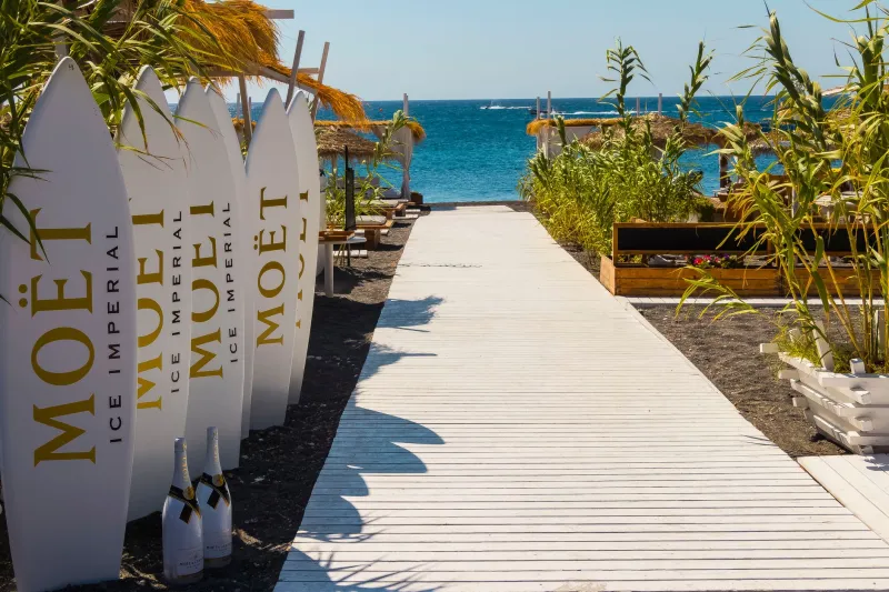 The Unexpected Gift: How the Finest Beach Clubs Master the Art of Orchestrated Surprise